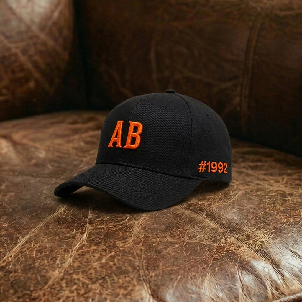 Andrea Berg Basecap „AB #1992“ – Schwarz/Orange